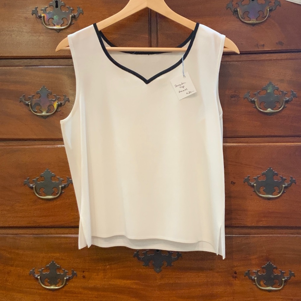 Elegant White Sleeveless Blouse with Black Trim